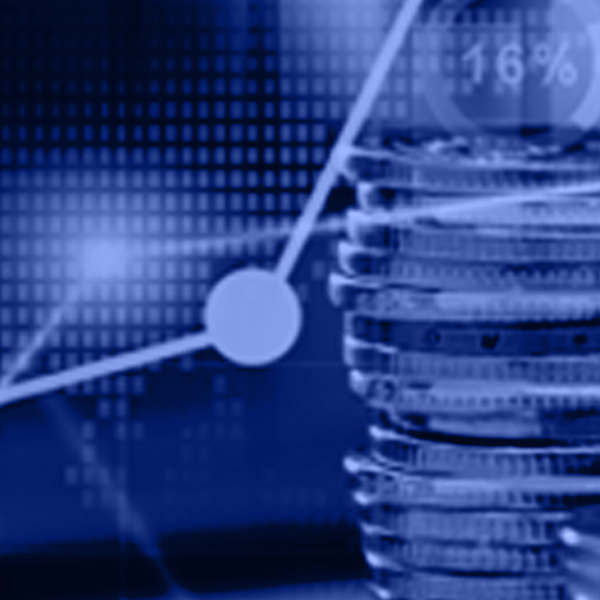 Hand with chart and stacks of coins